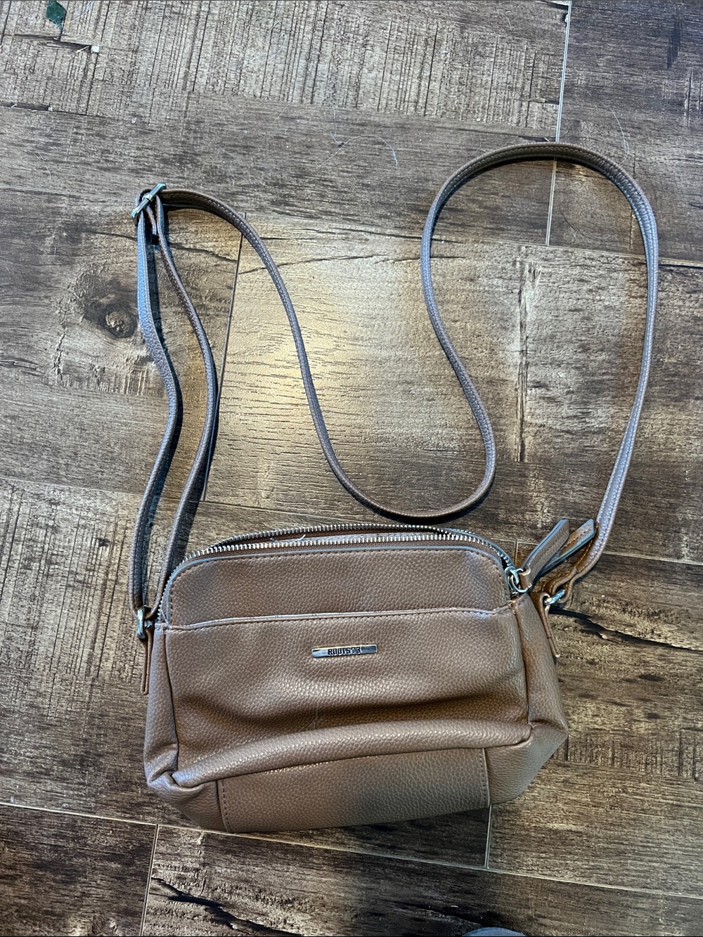 Small ROOTS 73 Pebbled Crossbody Bag in Taupe